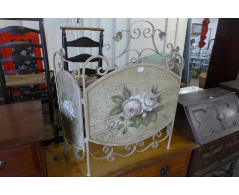 A hand painted folding firescreen
