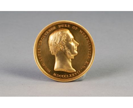 L.C. WYON GOLD PLATED PORTRAIT MEDALLION depicting Hugh Lupus Grosvenor - Duke of Westminister, K.G. MDCCCLXXVII, and verso a