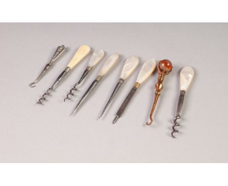 LATE VICTORIAN TINY BUTTON HOOK, with silver handles, 2 3/4" long, Birmingham 1900; TWO SMALL CORKSCREWS with mother o'pearl 
