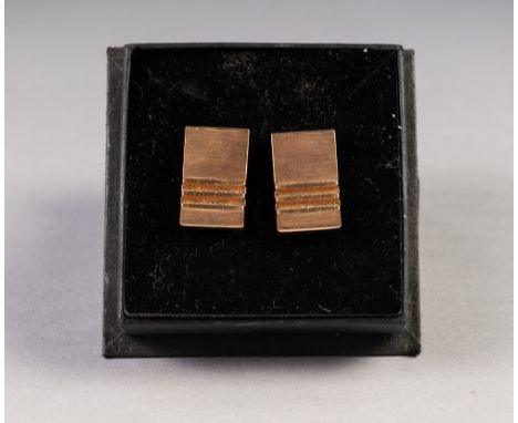 PAIR OF 9ct GOLD 'T' BAR CUFF LINKS, the textured oblong tops having ladder cross bars to one end, 9.9gms, boxed 