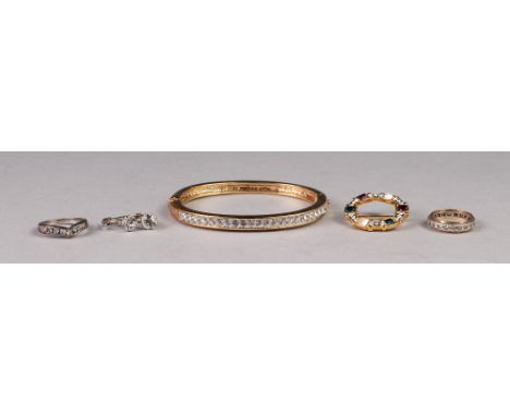 9ct GOLD AND WHITE STONE ETERNITY RING, a metal and cubic zirconia RING;  a gold plate and paste set hinge opening BANGLE;  a