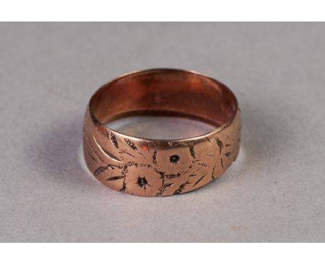 9ct GOLD BROAD BAND RING engraved with flowers, 2.7 gms, ring size J/K