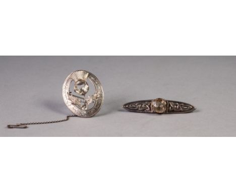 SCOTTISH SILVER OVAL OPENWORK BROOCH, the thistle centre set with a Cairngorm, Edinburgh 1962 and a SCOTTISH SILVER CELTIC EM