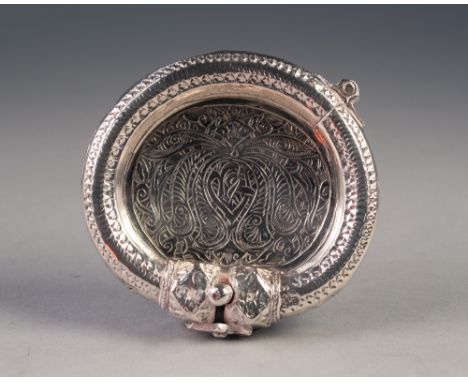 UNMARKED FOREIGN SILVER COLOURED METAL ASHTRAY, with hinged bangle pattern border and engraved floral centre, 4" x 3 ½" (10.2