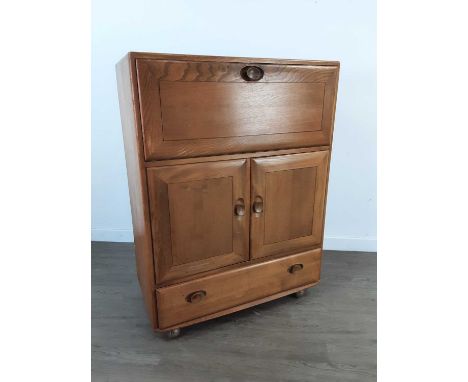 ERCOL MODEL 469 WINDSOR BUREAU / COCKTAIL CABINET,in golden elm and beech, 82cm wideCondition good to fair. Surface wear incl