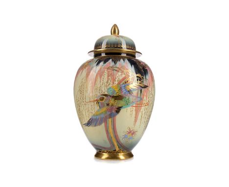 CARLTONWARE JAR AND COVER,decorated with the Sketching Bird pattern in coloured enamels and gilt on a cream ground, 28cm high
