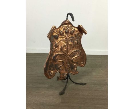 GLASGOW SCHOOL ARTS &amp; CRAFTS COPPER PLATED FIRESCREEN,bearing floral design in relief, on wrought iron frame, 74cm high