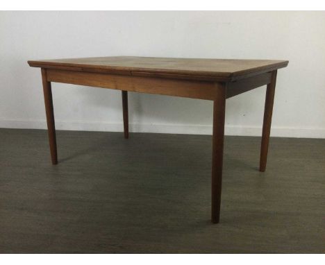 DANISH TEAK EXTENDING DINING TABLE OF MID-CENTURY DESIGN,the oblong top with two pull-out leaves, on tapered circular support