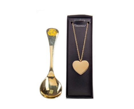 GEORG JENSEN SILVER-GILT AND ENAMEL SPOON,15cm long, along with a Georg Jensen gold plated christmas ornament, both in origin