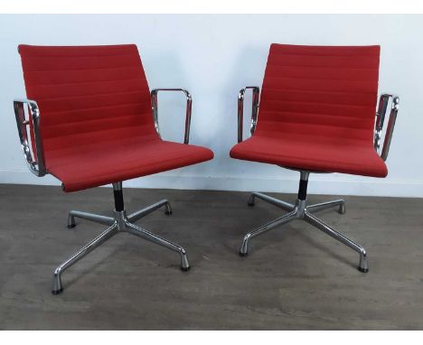 SET OF EIGHT EA108 OFFICE SWIVEL CHAIRS BY VITRA,officially licensed to the 1958 design by Charles and Ray Eames, in red clot