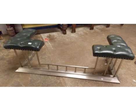 VICTORIAN POLISHED STEEL AND BUTTON LEATHER UPHOLSTERED CLUB FENDER