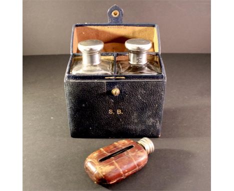 Gentleman's Asprey twin Silver topped Cologne bottles in original box. Date indistinct. Plus a miniature crocodile flask. Bot