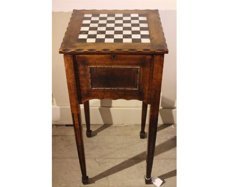 An early 20th Century Sewing Box on legs / Games Table with Chess Board Top