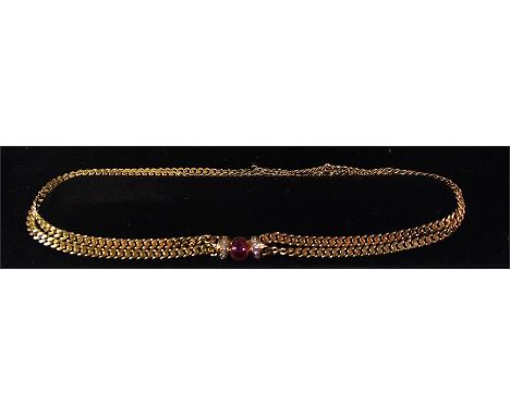 An 18ct ruby and diamond necklace, having oval cabachon ruby flanked by two rows, each of five graduated brilliant-cut diamon