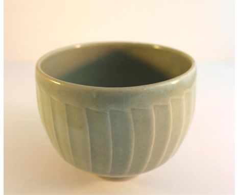 A David Leach studio pottery bowl in celadon glaze. H-10cm