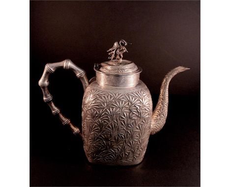 A 19th Century Chinese Silver export teapot with Dragon finial and Bamboo decoration. Approx 718 grams, height 20 cms. CONDIT