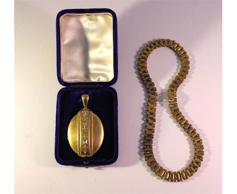 A Victorian yellow gold oval Locket, having 5 old cut diamonds set vertically to the front, together with a flat link unmarke