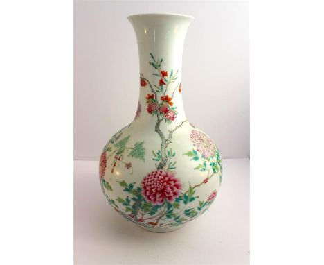 A Chinese famille rose enamel bottle vase, Guangxu, the broad body finely painted with peony, chrysanthemums and cluster of p