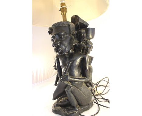 Large carved Makonde ebony wood tribal lamp base with shade. 42cms high.