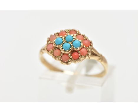 A 9CT GOLD CORAL AND TURQUOISE RING, designed as a cluster of four turquoise and twelve coral stones in yellow gold prong set