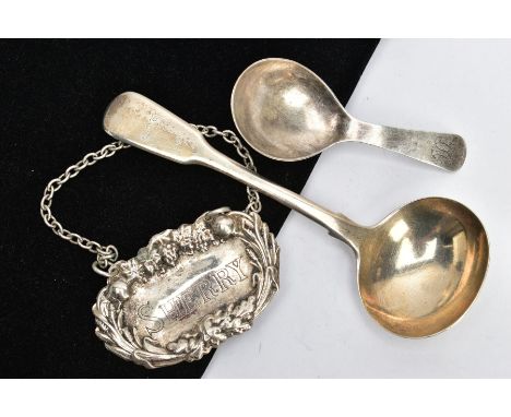 A SILVER SAUCE LADLE, CADDY SPOON AND A WHITE METAL DECANTER LABLE, Victorian fiddle pattern sauce spoon, engraved initials t