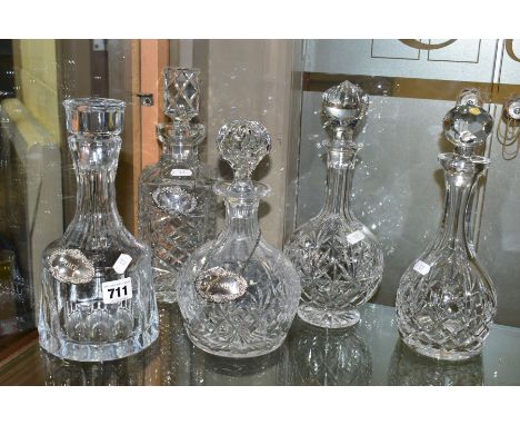 FIVE CUT CRYSTAL DECANTERS, THREE SILVER DECANTER LABELS AND A LARGE FRAMED PICTURE, comprising five crystal decanters with s