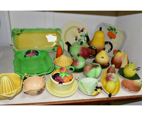 A COLLECTION OF NOVELTY FRUIT AND VEGETABLE SHAPED CARLTON WARE POTTERY AND OTHER CARLTON WARE WITH RELIEF MOULDED FRUIT AND 