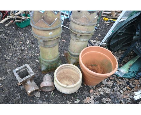 A PAIR CLAY CHIMNEY POTS, diameter 34cm x height 81cm, a terracotta circular planter (some damage to top rim) a smaller plant