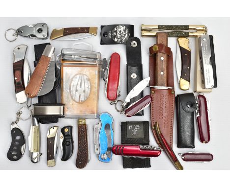 AN ASSORTMENT OF POCKET AND SWISS KNIVES, a collection of knives, pocket knives, Swiss army knives and tools