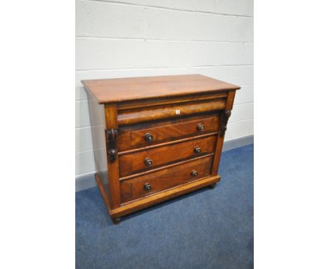 A VICTORIAN FLAME MAHOGANY SCOTCH CHEST OF FOUR DRAWERS, with the top drawer ogee fronted over three graduated drawers on bul
