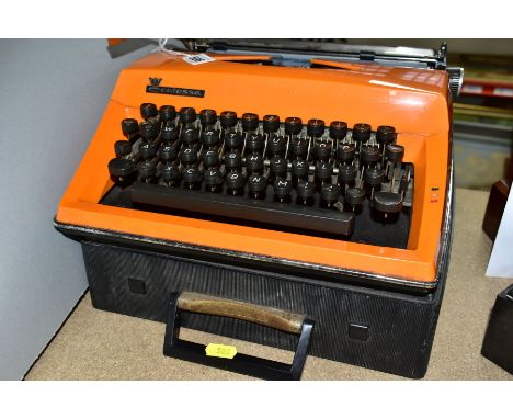 AN ADLER CONTESSA ORANGE TYPEWRITER, 1960s/70s with case, width 30cm, depth 32cm, height 8cm (Condition report: good, appears