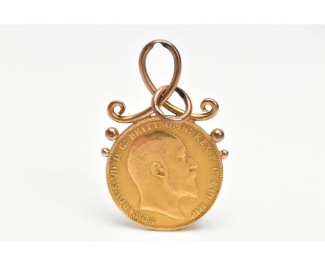 A MOUNTED FULL SOVEREIGN PENDANT, the sovereign depicting Edward VII, George and the Dragon dated 1910, mounted with a scroll
