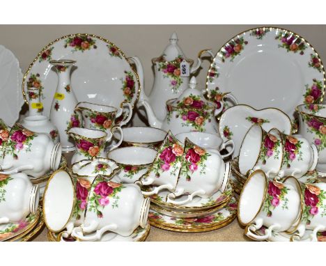 A ROYAL ALBERT OLD COUNTRY ROSES TEA AND COFFEE SERVICE WITH ADDITIONAL ITEMS , comprising a tea pot, height 16.5cm, coffee p