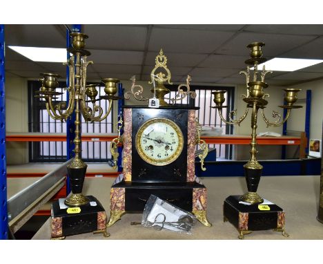 A LATE 19TH CENTURY AND LATER BLACK SLATE, MARBLE AND GILT METAL CLOCK GARNITURE, the rectangular clock case with scrolled su