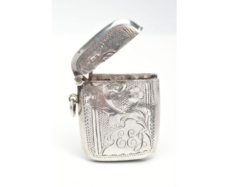 A SILVER VESTA, of a rounded rectangular form, decorated with a floral and foliage design, approximate height 47mm, approxima