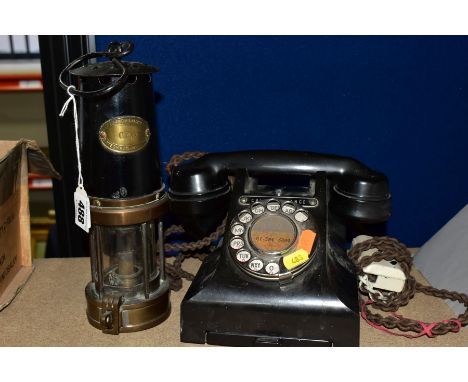 A MINERS SAFETY LAMP AND BAKELITE ROTARY TELEPHONE, comprising a Paterson Lamps Ltd GPO miners safety lamp, and a black Bakel