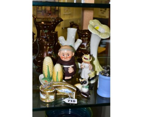 A SMALL COLLECTION OF CERAMICS INCLUDING A LATE 19TH CENTURY PARIS PORCELAIN SNUFF BOX OF COMMA SHAPE, painted with cherubs a
