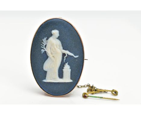 A WEDGWOOD CAMEO BROOCH, navy and white cameo signed to the base 'Wedgwood', within a collet mount, stamped '9ct', fitted wit