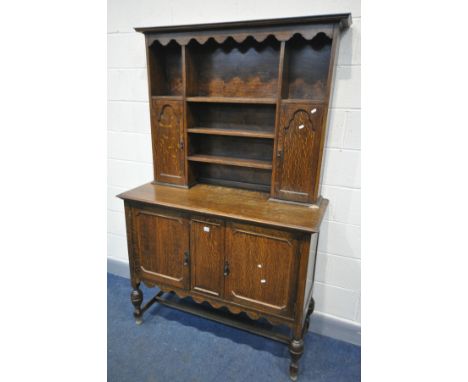 AN OAK DRESSER with various cupboard doors, width 122cm x depth 51cm x height 195cm and an oak gate leg table (2)