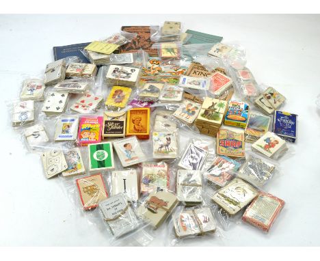 A large assortment of vintage playing cards and other games (card related). Look to be some complete sets with some interesti