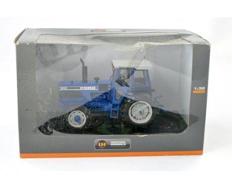 Universal Hobbies 1/32 farm issue comprising Ford 8830 Tractor. Excellent and secure in box, box with significant storage wea