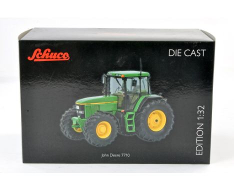 Schuco 1/32 farm issue comprising John Deere 7710 Tractor. Excellent and secure in box. 