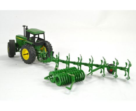 Siku 1/32 John Deere 4455 customised tractor, plough and press combination. Generally very good. 