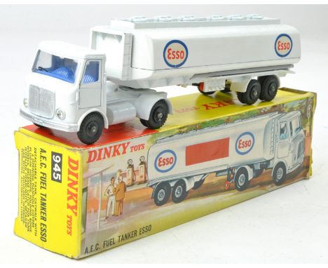 Dinky No. 945 AEC Esso Tanker. Blue Interior and Black Plastic Hubs with unusual decal variation. Excellent, the odd minor ma