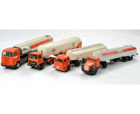 A group of four Esso liveried truck issues from various makers, some code 3. Generally good to very good. 