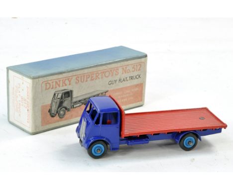 Dinky No. 512 Guy Flat Truck. First Type. Blue Cab and Chassis with red back, mid blue hubs. Very good to excellent, some min