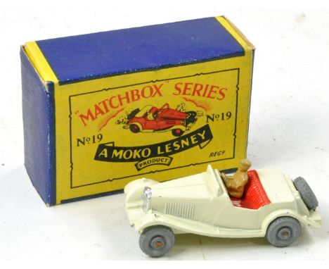 Matchbox Regular Wheels No. 19a MG Midget Sports Car. White with red seats, tan driver, metal wheels and silver trim. General