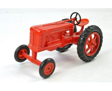 Unidentified Plastic Large Scale, approx 1/16 International Farmall M Tractor, made in England. Wide Front Axle and Hard Plas