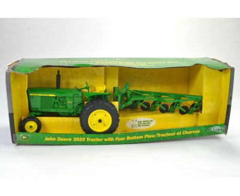 Ertl 1/16 Model Farm Issue comprising John Deere 3020 Tractor with Four Bottom Plow. Appears excellent and never removed from