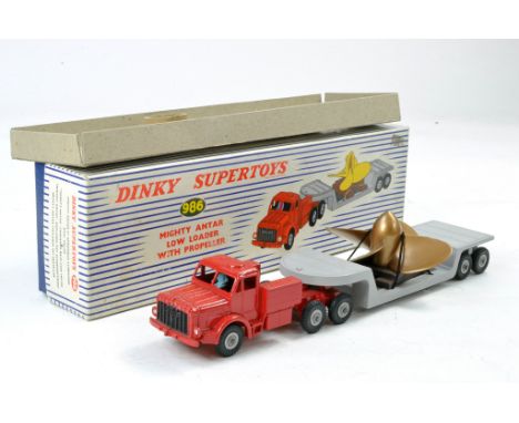 Dinky No. 989 Mighty Antar Low Loader with Propeller Blade. Red and Grey. Generally very good some marks and wear to tractor 